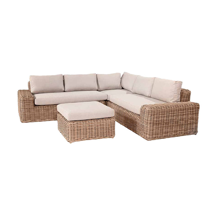 Right-angle perspective of the Como Natural Antique Outdoor Corner Set, showing its durable rattan construction and elegant beige cushions, designed for outdoor relaxation.