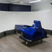 Cool Performance F1 Half Cockpit racing simulator positioned within a large curved projection screen environment for immersive Formula racing simulation.