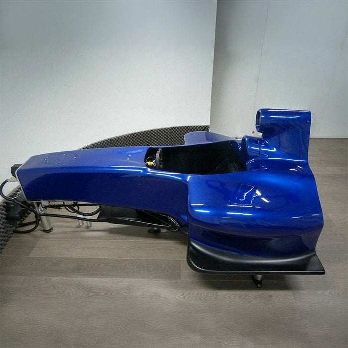 Side profile of the Cool Performance F1 Half Cockpit racing simulator featuring authentic Formula racing bodywork, open-wheel styling and professional simulator cockpit design.