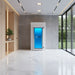 White Cryo-iCConiQ PRO electric cryochamber featured in a minimalist spa interior with natural light, combining cryotherapy with elegant design aesthetics.