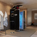 Cryo-iCConiQ SOLO nitrogen cryosauna in a luxury wellness suite, with mist rising from the chamber and plush robes hanging nearby, showcasing a high-end spa setting.