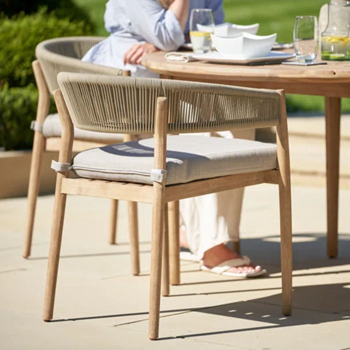 Denver Outdoor 4-Seater Dining Set  with rope chairs and acacia wood table in the background.