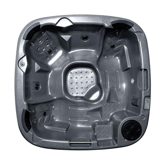 Overhead interior view of circular grey hot tub showing seating and jet placement.