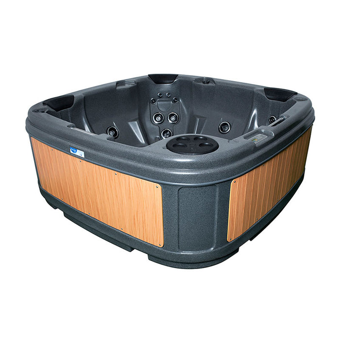 Circular hot tub in dark grey with beige wooden side panels and cover on.