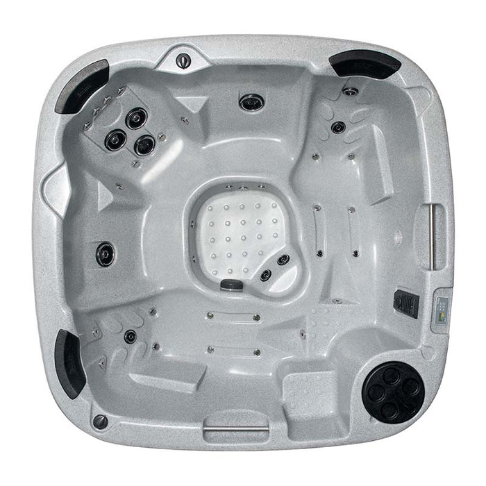 Top interior view of a light grey hot tub displaying seats and water jets