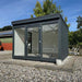 Premium Estholz OLIVER garden house with sleek modern design, double glass doors, and insulated walls—perfect for year-round use as a garden room or workspace.