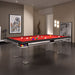 Etrusco Casino pool table with deep red felt, black frame and clear acrylic legs, featured in a modern interior with artistic decor.