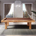 Etrusco Casino pool table featuring an olive wood frame with brown cloth, placed in a refined interior with crystal chandelier and scenic views.