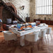 Etrusco Casino pool table in white frame, converted into a functional office desk with orange top in an industrial loft environment.