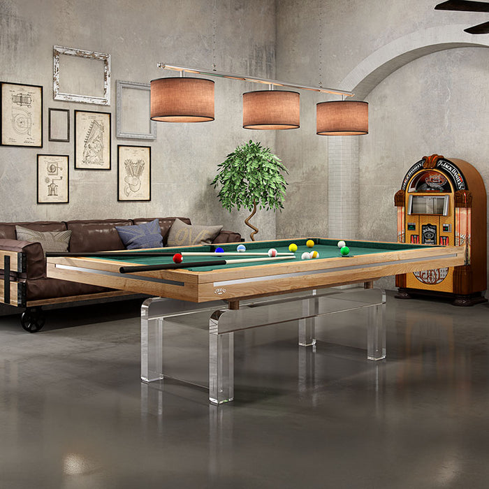 Etrusco Contemporaneo pool table in natural wood finish with green cloth, placed in a retro-industrial themed room with a jukebox.