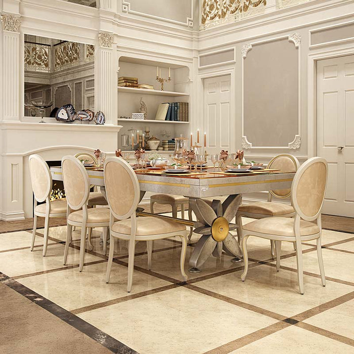 Etrusco Narciso pool table converted to a dining table with gold accents and flower-petal shaped base, set in a regal, classical room.