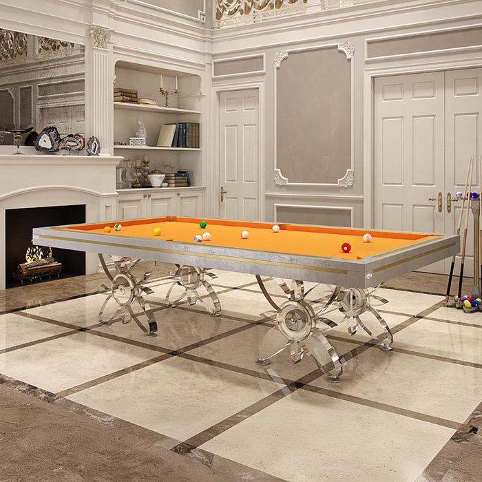 Etrusco Narciso pool table with vibrant orange felt and triple-floral chrome base, showcased in an elegant classical room with marble flooring.