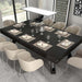 Etrusco P40 pool dining table in full black matte finish, elegantly transformed into a formal dining setup with beige chairs, fine tableware, and minimalist decor in a bright contemporary space.