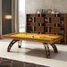 Etrusco P40 designer pool table with golden oak frame and mustard yellow cloth, featured in a stylish room with decorative bookshelves and soft drapes, combining elegance with play.