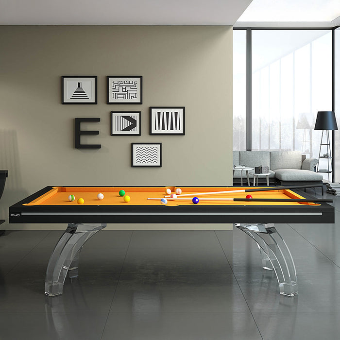 Etrusco P40 luxury pool table with black frame, orange cloth, and crystal-clear acrylic legs, styled in a sleek minimalist living space with designer accents and soft natural light.