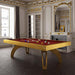 Etrusco P40 luxury pool table in golden finish with deep red cloth, styled in an opulent room with ornate mouldings and classic French decor, combining classic elegance with modern play