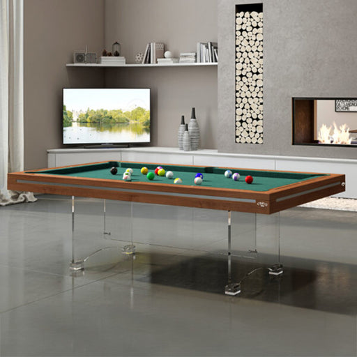 Modern luxury Etrusco P50 pool table with green felt and transparent acrylic legs, set in a contemporary living room.