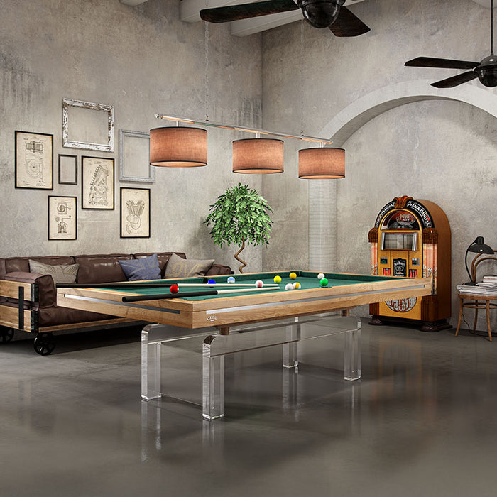 Natural wood Etrusco P50 pool table with sleek green playing surface and acrylic leg support in a retro-style lounge.