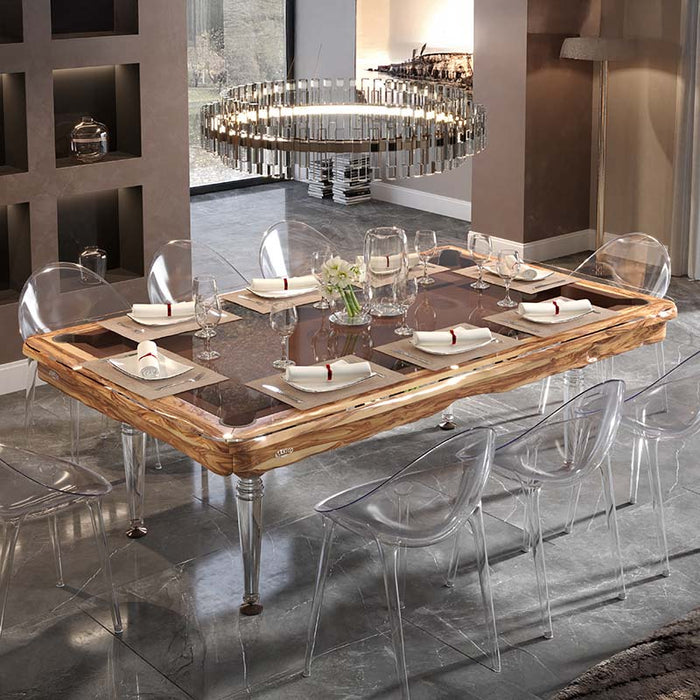 Etrusco Smile pool table transformed into a dining table with olive wood finish, transparent chairs, and elegant table settings.