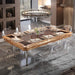 Etrusco Smile pool table transformed into a dining table with olive wood finish, transparent chairs, and elegant table settings.