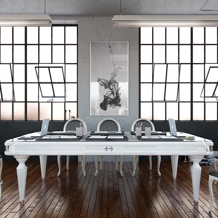 Convertible Etrusco Smile pool table in white used as a modern boardroom table in an industrial-style office interior.
