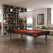 Etrusco Smile pool table in black finish with red cloth, styled in an elegant library-themed interior with chandelier lighting.