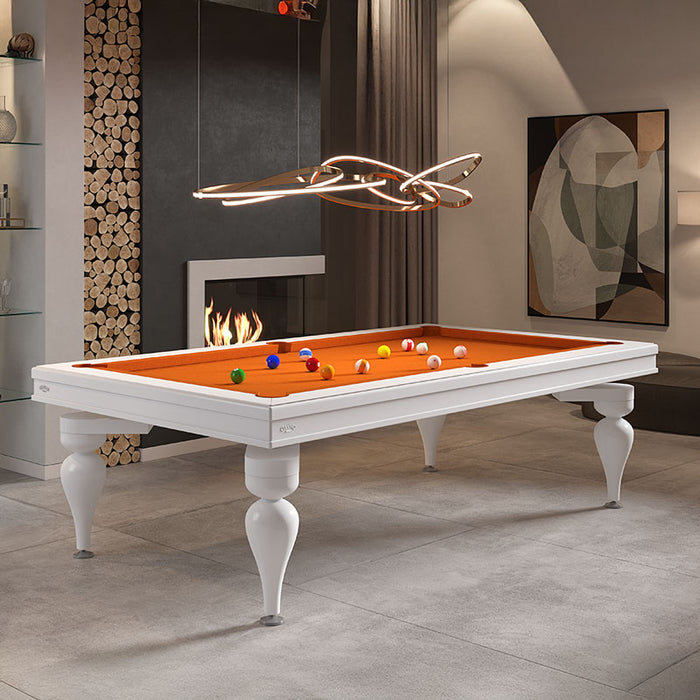 White Etrusco Smile pool table with bold orange cloth in a chic lounge interior, styled with a fireplace and modern lighting.