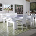 Etrusco Top pool table with a white frame and glass top, arranged in a stylish bar area for dual-purpose use as a modern dining table.