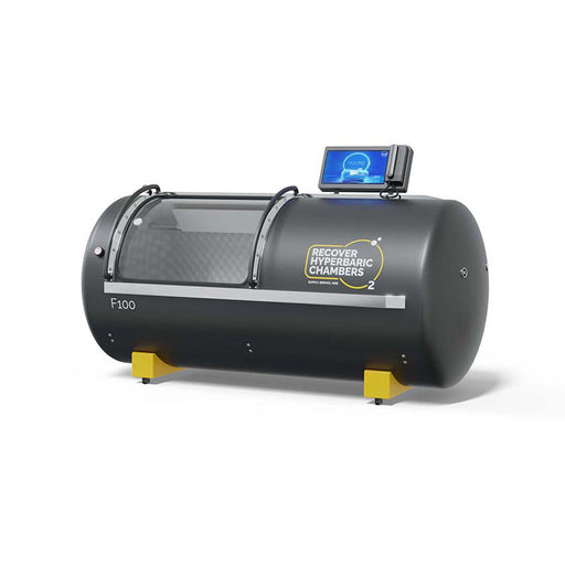 Angled right view of Recover F100 Steel Hyperbaric Chamber with monitor on top.