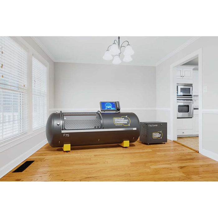 Angled view of F75 steel hyperbaric chamber in a residential setting.