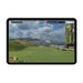 Close-up of the tablet displaying the golf simulation at Pebble Beach course.