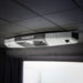 Detailed view of Foresight Falcon overhead golf launch monitor installed on a black ceiling panel, showcasing sensor grid and glowing status light.