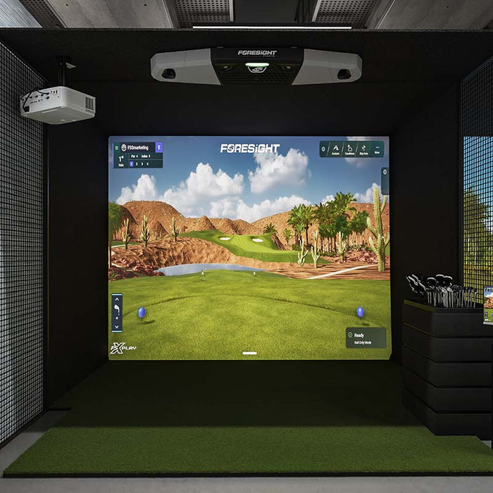 Indoor golf simulator setup with Foresight Falcon overhead launch monitor in use, featuring a realistic driving range display.