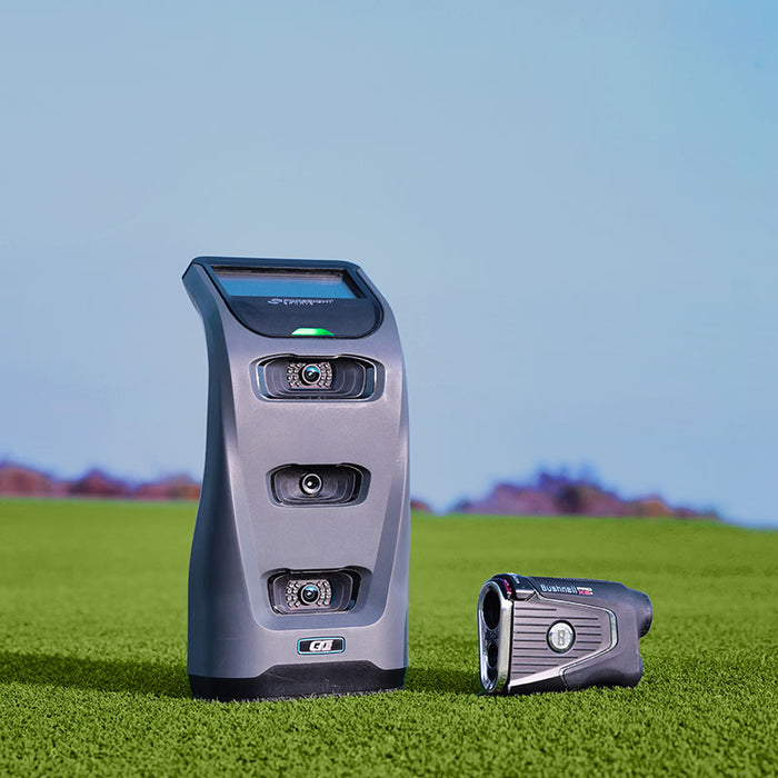 Foresight GC3 Launch Monitor and Bushnell rangefinder side by side on a golf course, ideal for accurate ball tracking.