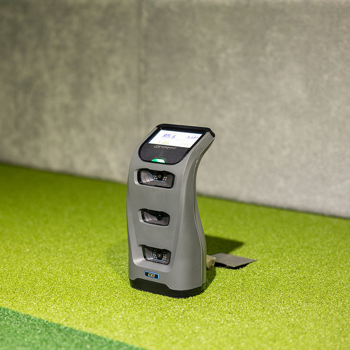 Foresight GC3 Launch Monitor displayed indoors with metrics visible on screen during indoor practice session.