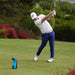 Golfer mid-swing using the Foresight GC3S Launch Monitor on a golf course, showcasing precision golf swing tracking and outdoor performance.
