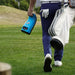 Golfer walking with the Foresight GC3S Launch Monitor in hand, showcasing its portable and lightweight design for easy transport.