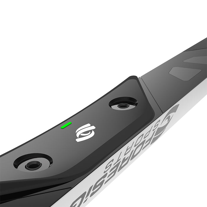 Angled close-up of Foresight GCHawk overhead launch monitor with illuminated status light and branding, showcasing high-speed optical sensors.