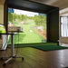 Indoor home golf simulator using Foresight Sim-in-a-Box, equipped with projector and tracking system for immersive practice sessions.