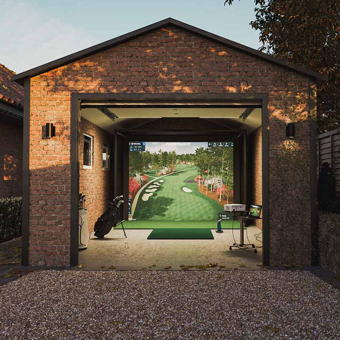 Full front view of garage-based Foresight Sim-in-a-Box Play Golf Simulator setup with open access, golf tech equipment, and simulator screen.