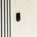 Close-up of temperature and humidity sensor in Geneva St. Moritz sauna, mounted on natural wood panel for climate control.