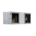 Angled side view of Geneva St. Moritz sauna with shower room, showing entrance door and large glass panels with visible HUUM heater.