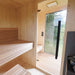 View from inside the Zermatt sauna showing front glass door, wooden flooring, and natural lighting, highlighting the serene design elements.