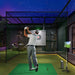A golfer practising target shots in an outdoor setup with the Golfjoy GDS Plus Launch Monitor, highlighting its versatility for both indoor and outdoor use.