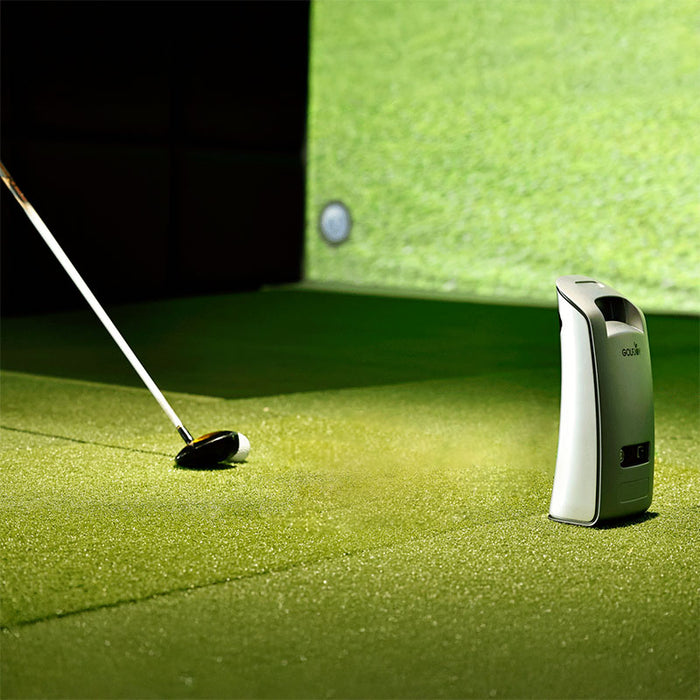 Golfjoy GDS Pro Launch Monitor positioned on a practice green, capturing real-time ball and club data for accurate performance tracking.