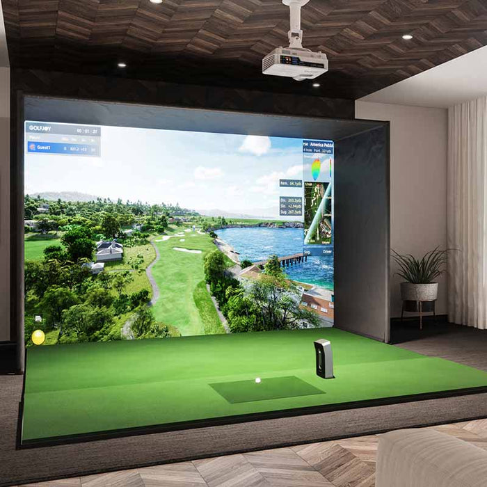 Elegant indoor Golfjoy Golf Simulator setup with a large screen showing a picturesque golf course, equipped with high-end golfing technology.