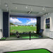 Golfzon simulator in a bright room setting.