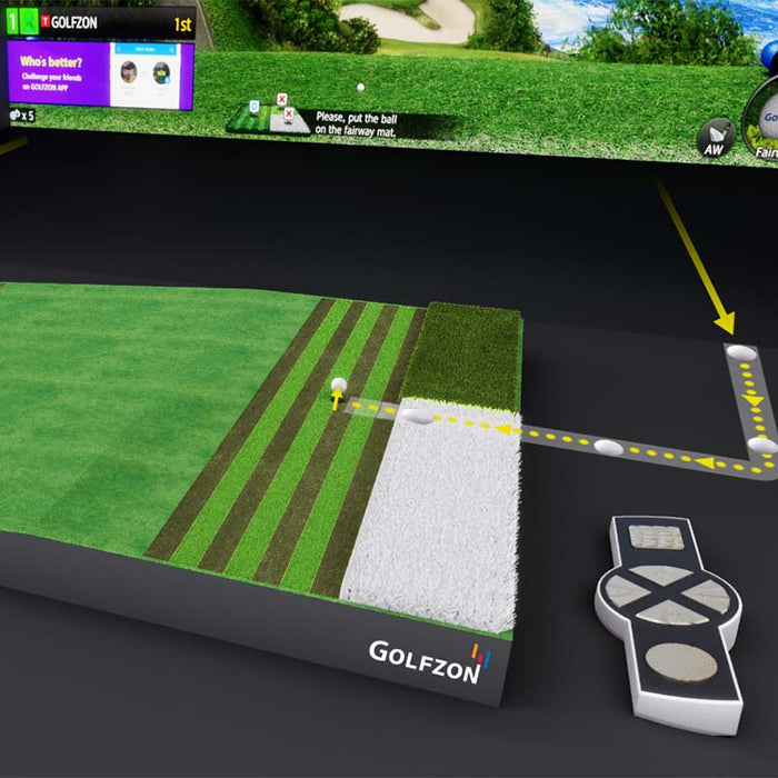 Close-up of Golfzon T2 simulator tee-off mat and control console.