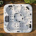 H2O Retreat Pro 5-Person Hot Tub aerial view showing full seating layout, jet configuration, and lounge seat position, installed on a timber deck