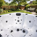 H2O Retreat Pro 5-Person Hot Tub white acrylic interior close-up showing contoured seating, jet placement, and footwell design